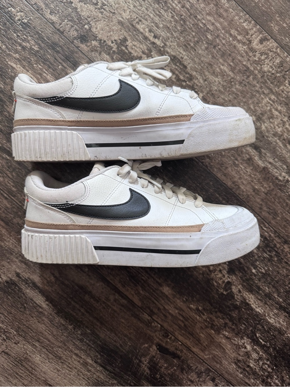 Nike womens’s White Sneakers with Black Swoosh and Tan Accents